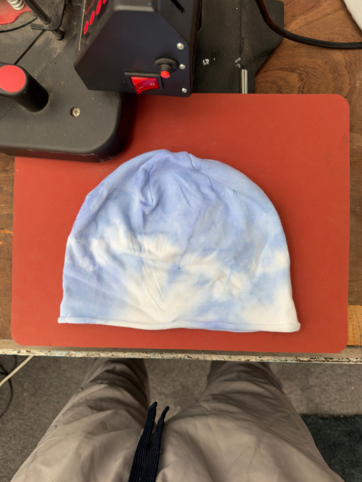 Hand-dyed beanie: light blue with creamy branching centre/lower patches.