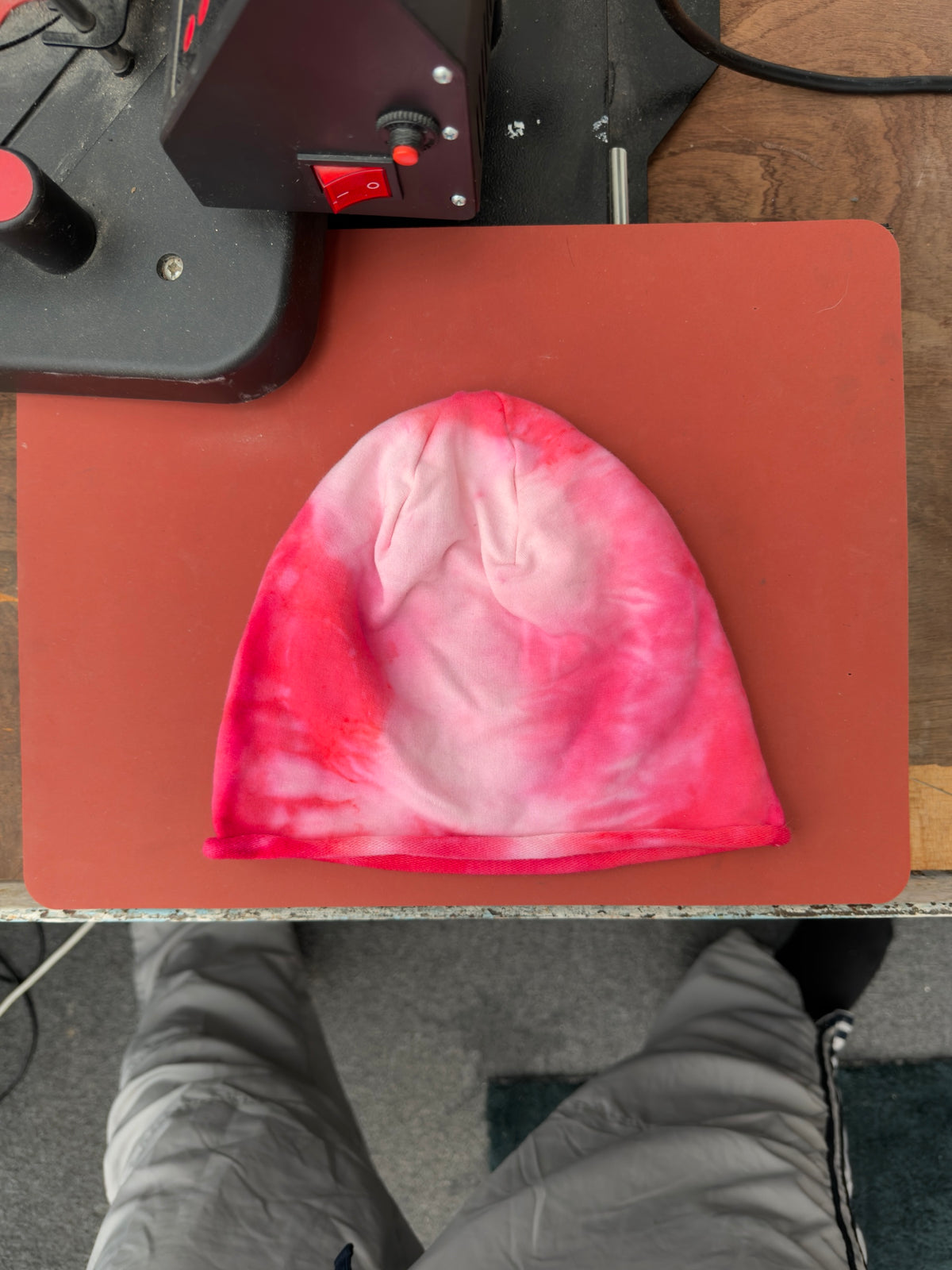 Hand-dyed red/pink beanie with a broad pale pink centre and red edges.